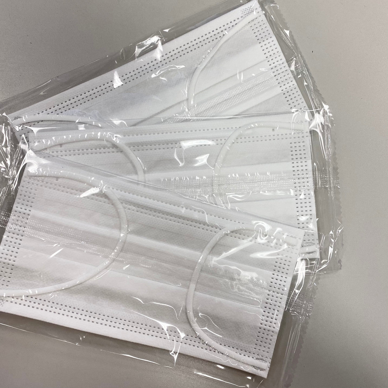 Ear Loop Face Masks - 3 ply, White, Individually Wrapped, 50/Box - CornellSurgical.com