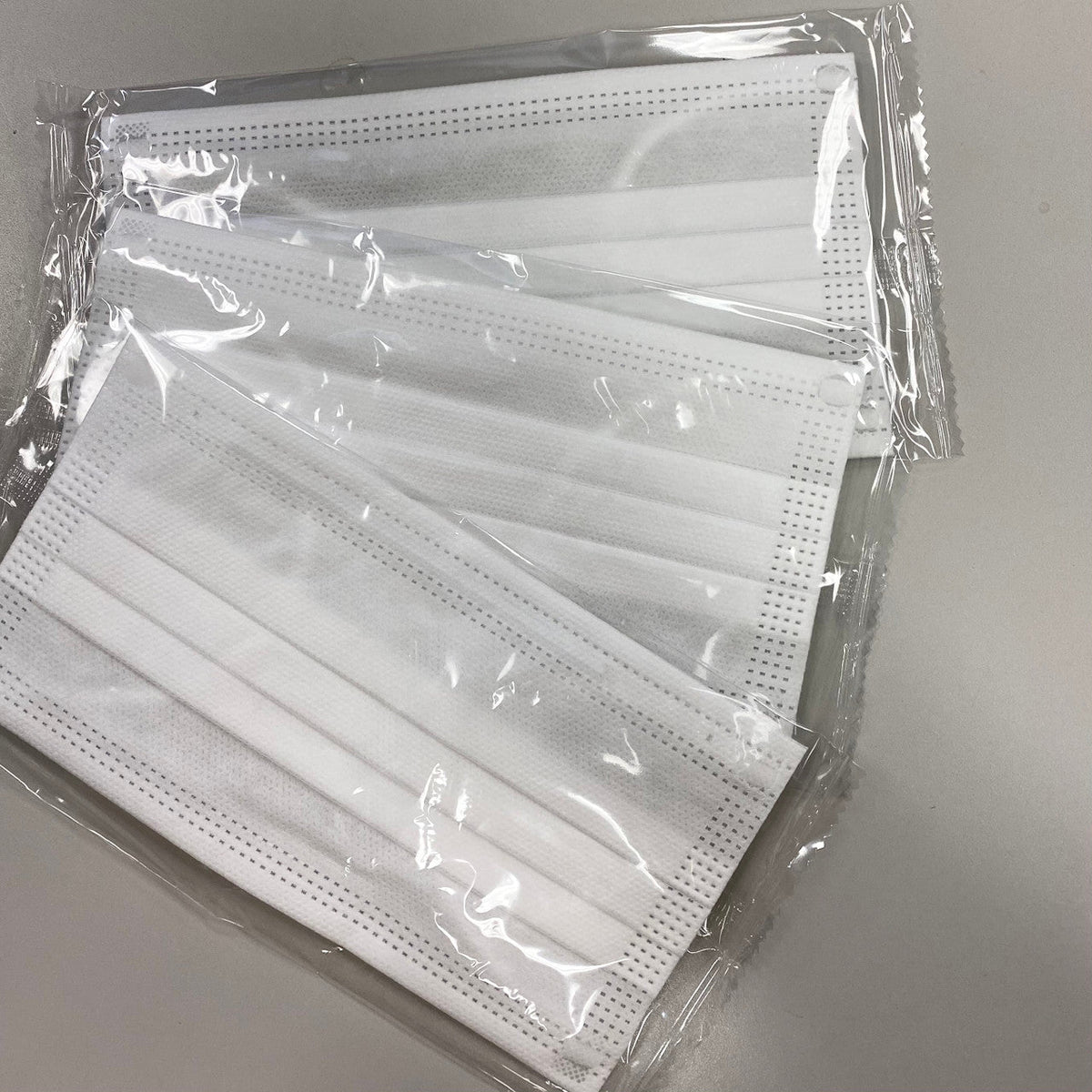 Ear Loop Face Masks - 3 ply, White, Individually Wrapped, 50/Box - CornellSurgical.com